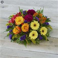 Bold and bright memorial posy for grave 